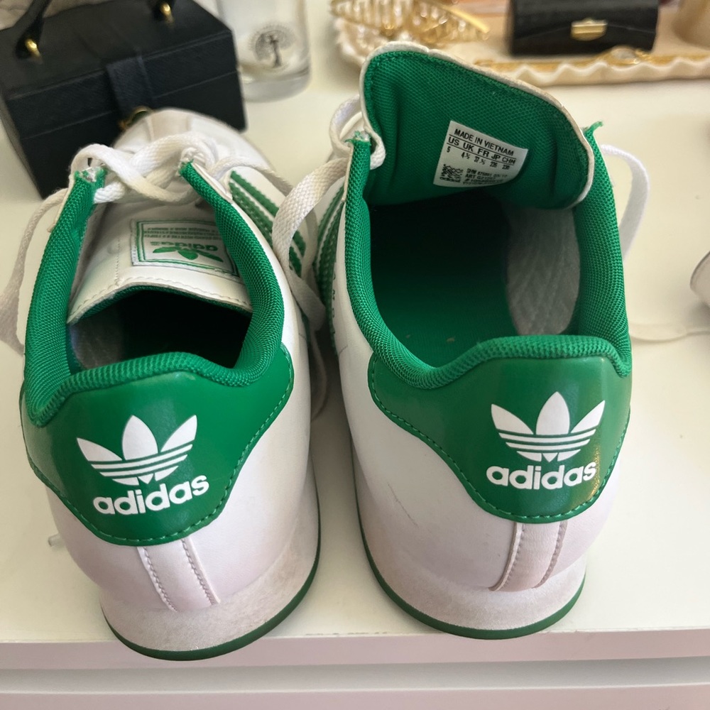 Green and white Adidas 💚